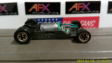 AFX RACING H.O. SCALE MEGA G+ 1.7 NARROW CHASSIS GOLD CHROME OUTLINE STAR