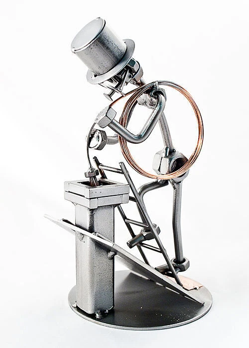 Schraubenmännchen Kaminkehrer oder Schornsteinfeger auf dem Dach - Bild 1 von 1