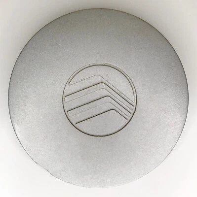 Tapacubos central Mercury Tracer 1997 1998 1999 F7K6-1A096-AB Foto 1 de 3