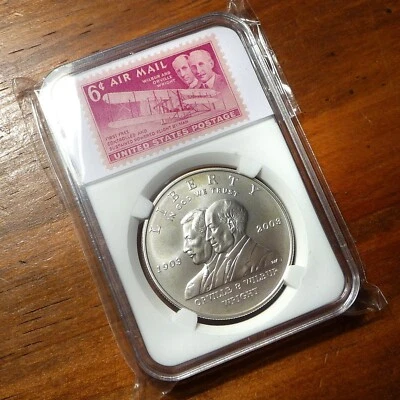 2003-P First Flight Wright Bros Commemorative Silver Dollar with Vintage Stamps - Image 1 of 4