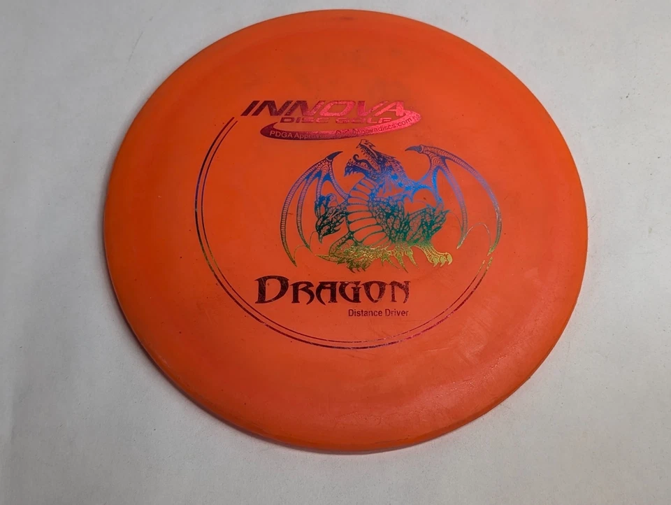 Innova DX Dragon Disc Golf Distance Driver PFN 150g Orange Lightweight - Image 1 of 4