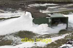 Photo 6x4 Snowdrift and bin Rosedale Abbey A wind toppled wheely bin from c2007