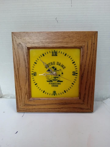 Notre Dame fighting Irish wall clock in a wood frame With new clock mechanism Cover