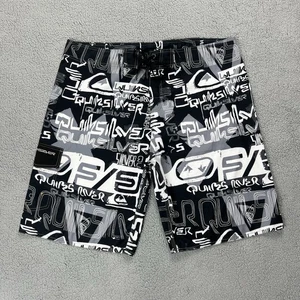 Vintage Quiksilver Board Shorts Size 44 Black White Logo Print Surf Swimwear - Picture 1 of 7