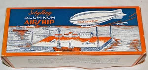 Vintage NIB Schilling Tin Toy 9” Aluminum Airship Graf Zeppelin RED Wheels - Picture 1 of 6