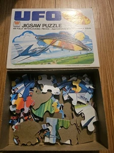 Vintage Whiman UFO Form Puzzle 1979 9" x 20" 48 Teile vollständig - Bild 1 von 2