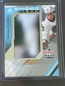 Nathan MacKinnon Banner Year Outdoors Lake Tahoe 2021-22 SP Game Used - Picture 1 of 2
