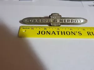 Placa de identificación con emblema de 2 pines estilo escritura estufa O'Keefe & Merritt 5,5" - Imagen 1 de 4