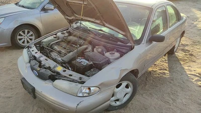 Оригинальный выпускной коллектор в сборе 1995-1997 Ford Contour 2,0 л F5rz9430d - Изображение 1 из 4