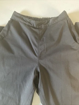 Pantalones FootJoy DryJoys para mujer negros con cremallera al tobillo rendimiento de golf al aire libre (G4) Foto 1 de 4