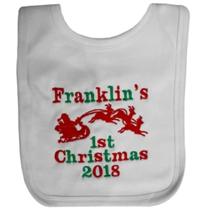 Babero 1ª Navidad Personalizado con Papá Noel y Trineo Rosa Azul Blanco Rojo Nombre - Imagen 1 de 1