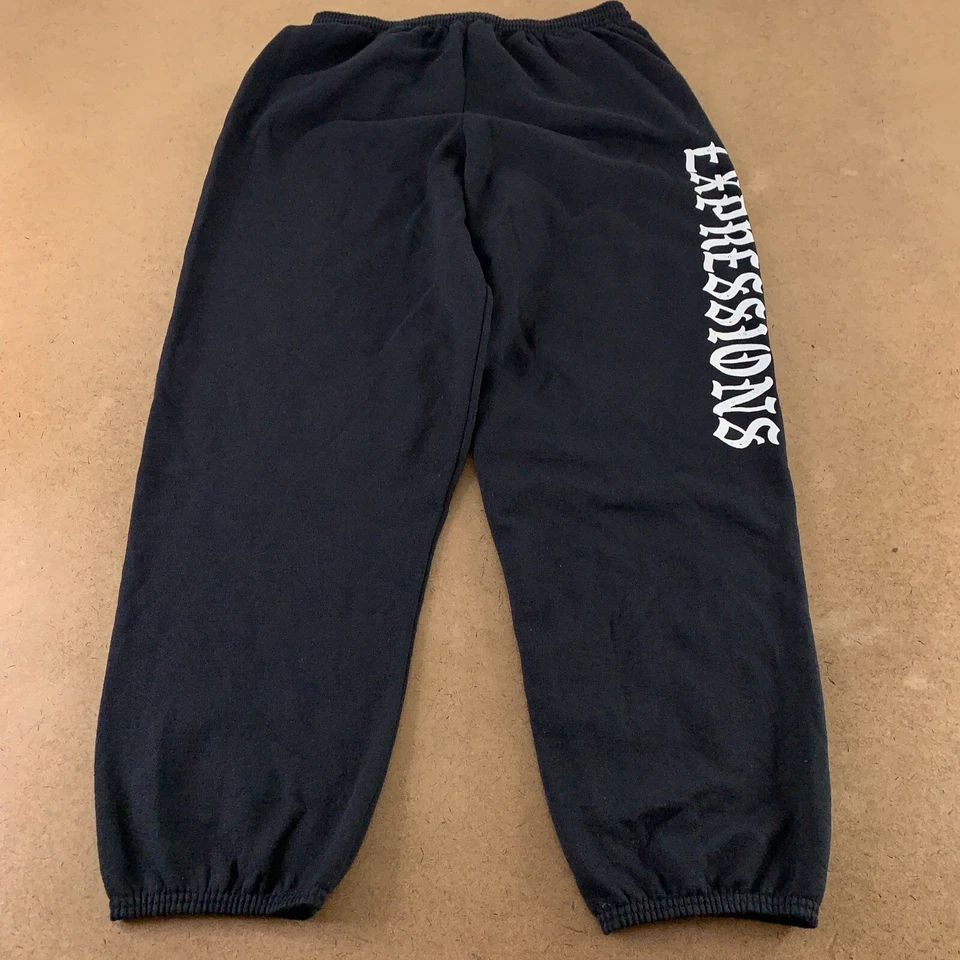 Pantalones deportivos clásicos Hanes para hombre talla grande negros con gráficos de expresiones de vellón Foto 1 de 4