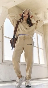 Free People Movement Udefeated Set Hooded Drawstring Waist Rib Ivory Tan L NWT - Picture 1 of 7