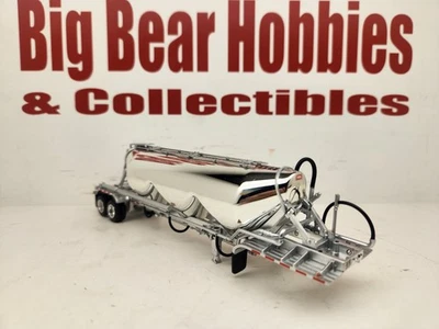 New 1/64 DCP Chrome & Silver Heil 3  Bay Tandem Axle Pneumatic Tank Trailer - Image 1 of 4
