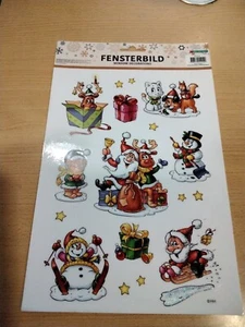 Kleine Fensterbilder Weihnachtsmann mit Katze Hund Eichhörnchen Bär Rentier - Bild 1 von 1