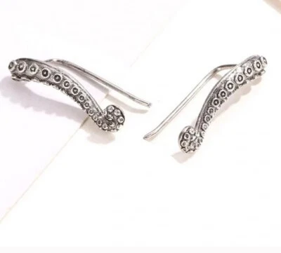 Escaladores de oreja de tentáculo pulpo Foto 1 de 2