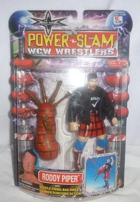 WWE WCW Power Slam WCW Luchadores Roddy Piper con Bolsa Pipa Sin usar, en caja Toy Biz 2000 Foto 1 de 4