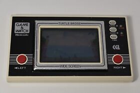 Vintage Nintendo Game And Watch electronic console Turtle Bridge CGL Game 1982