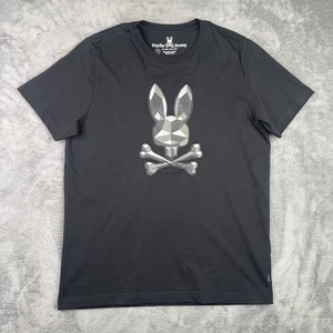 T-shirt Psycho Bunny uomo 5 media nera teschio incrociato logo audace ricamo spigoloso - Foto 1 di 11