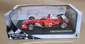 HOT WHEELS RACING FERRARI F2005 1:18 MICHAEL SCHUMACHER G9727 WORLD CHAMPIONS  - Foto 1 di 15