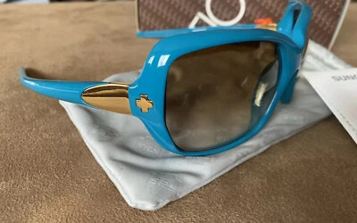 Nuevo En Caja GAFAS DE SOL DINASTÍA ÓPTICA ESPÍA Azul Turquesa con Marrón Desteñido Degradado Foto 1 de 4