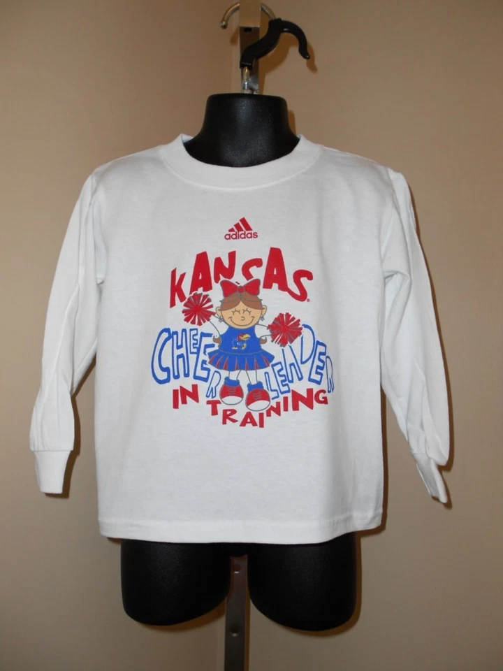 NOVA CAMISA BRANCA MANGA LONGA KANSAS JAYHAWKS CRIANÇA 3T Adidas - Imagem 1 de 1