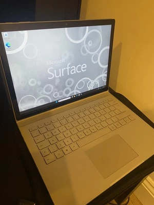 NEAR MINT MICROSOFT SURFACE BOOK LAPTOP- 16GB RAM AND i7 PROCESSOR - GTX 1050 - Image 1 of 4