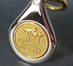 Vintage MIRAGE Hotel Casino Las Vegas Gold Tone Silver Tone Metal Keychain Fob - Picture 1 of 11