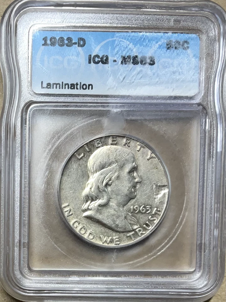 Mint Error  1963 D Franklin Half Dollar ICG MS63  obverse Lamination 90% Silver - Image 1 of 4