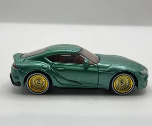 Matchbox Toyota GR Supra in grünmetallic mit Real Riders (CUSTOM) - Bild 1 von 7