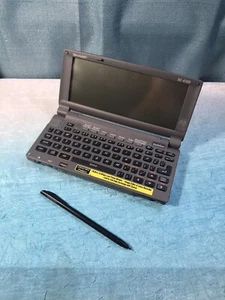 Rzadki SHARP HC-4100 Vintage PDA Windows CE Ręczny komputer kieszonkowy Ultra przenośny - Zdjęcie 1 z 9