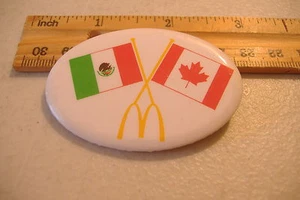 ~MCDONALDS~MEXICO & CANADA FLAGS~OVAL BUTTON PIN~ - Picture 1 of 2