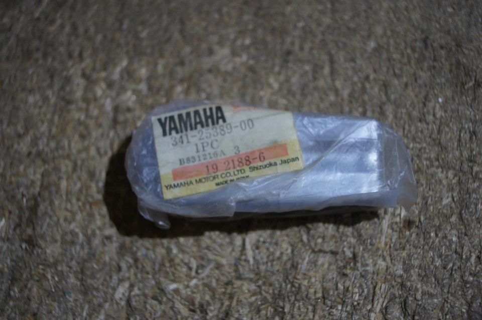 YAMAHA XS650 TX650 TX750 RH REAR CHAIN ADJUSTER 341-25389-00 OEM  NOS - Image 1 of 4