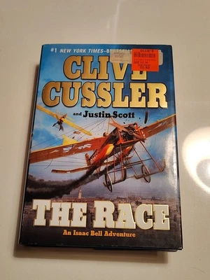 The Race An Isaac Bell Adventure 1st Ed. by Clive Cussler & Justin Scott 2011 HC - Image 1 of 4