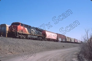 Original Slide- CN ES44AC 2909 & Train At Gary, IN. 3/24 - Picture 1 of 1