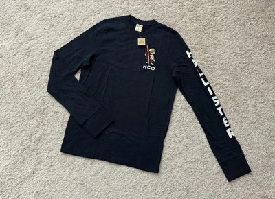 NWT Hollister Y2K Men's Navy Long Sleeve Crew Neck Surf Boy Graphic Tee Sz S - Image 1 of 4