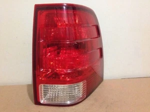 2003,2004,2005,2006 FORD EXPEDITON PASSENGER RH SIDE TAIL LIGHT OE - Picture 1 of 6