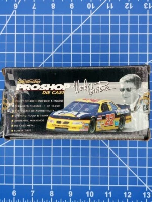 Ward Burton #22 CAT Dealers 2000 NASCAR Ertl Pro Shop 1:64 BRAND NEW - Image 1 of 4
