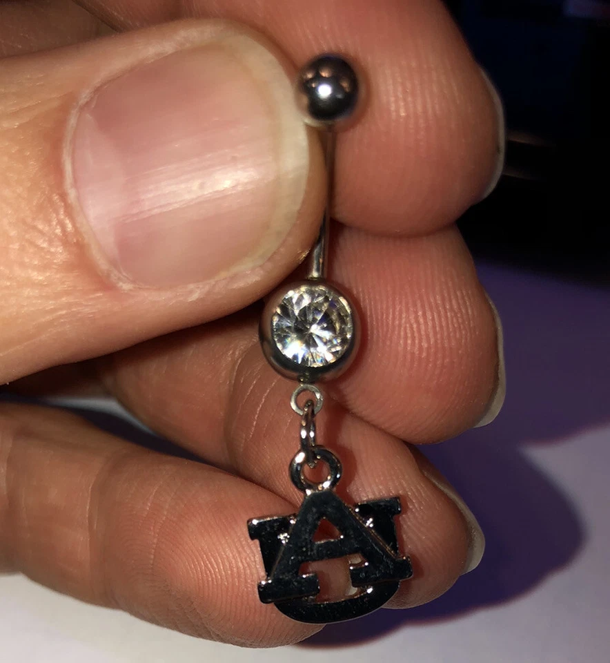 auburn university “AU” 14ga. anillo vientre con piedra transparente Foto 1 de 1