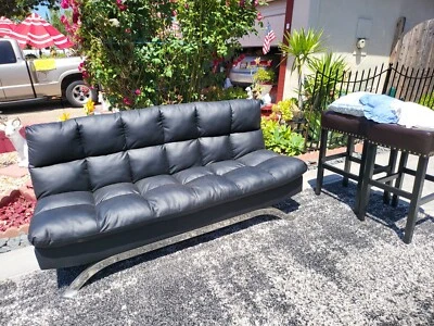 Used, in very good condition, Black faux leather futon sofa bed 3 seater - Image 1 of 2