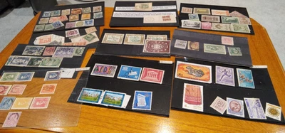 Stamps Worldwide in 30  Display Cards Free UK Postage  - Image 1 of 3