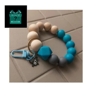 Schlüsselanhänger/-armband Elastisch, Silikon-Holz, etc. Perlen + 1 Armband - Bild 1 von 4