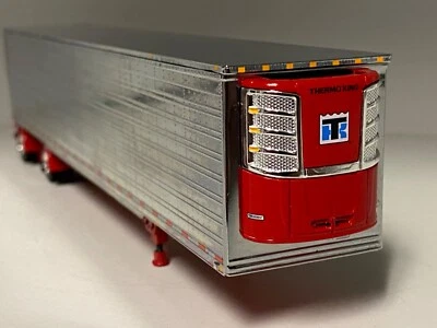 Remolque utilitario cromo y rojo eje extendido DCP 1/64 53' con refrigerador termocontraíble Foto 1 de 2