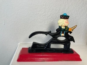 Nutcracker Wearing a Black Uniform Carrying a Sword-Small but Fairly Heavy-Works - Picture 1 of 5