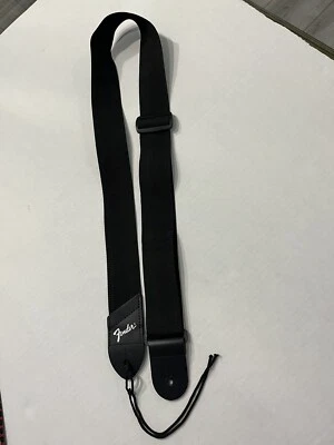 Correa de guitarra Fender. Correa Polyweb negra de 2" de ancho, extremo con logotipo plateado Foto 1 de 3
