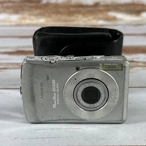 Canon PowerShot Elph SD630 6.0 Digital Camera FOR PARTS/REPAIRS ONLY ROUGH SHAPE - Picture 1 of 5