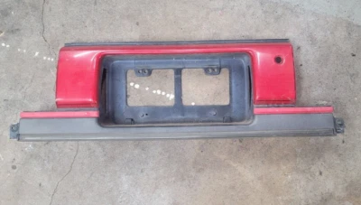 Adorno de matrícula central luz trasera Toyota Supra 1990-92 Foto 1 de 4