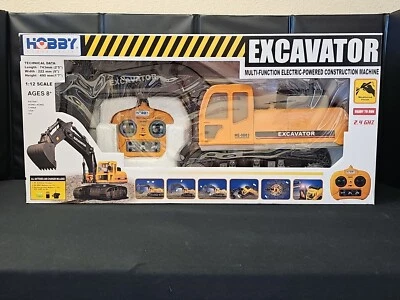 HOBBY ENGINE R/C Excavator 2.4 GHZ 1:12 SCALE Engineering Vehicle NEW IN BOX  - Image 1 of 4