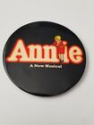 ANNIE A NEW MUSICAL MOVIE PROMO BUTTON . SIZE 3 1/2 INCH.