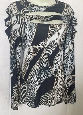 TOP “VENUS” AJUSTADO SILUETA NEGRO MULTI ANIMAL PRINT TALLA L Foto 1 de 4
